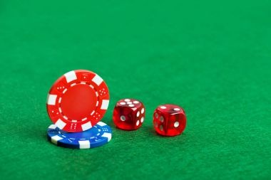 Close-up of roulette wheel showing numbered pockets and betting layout